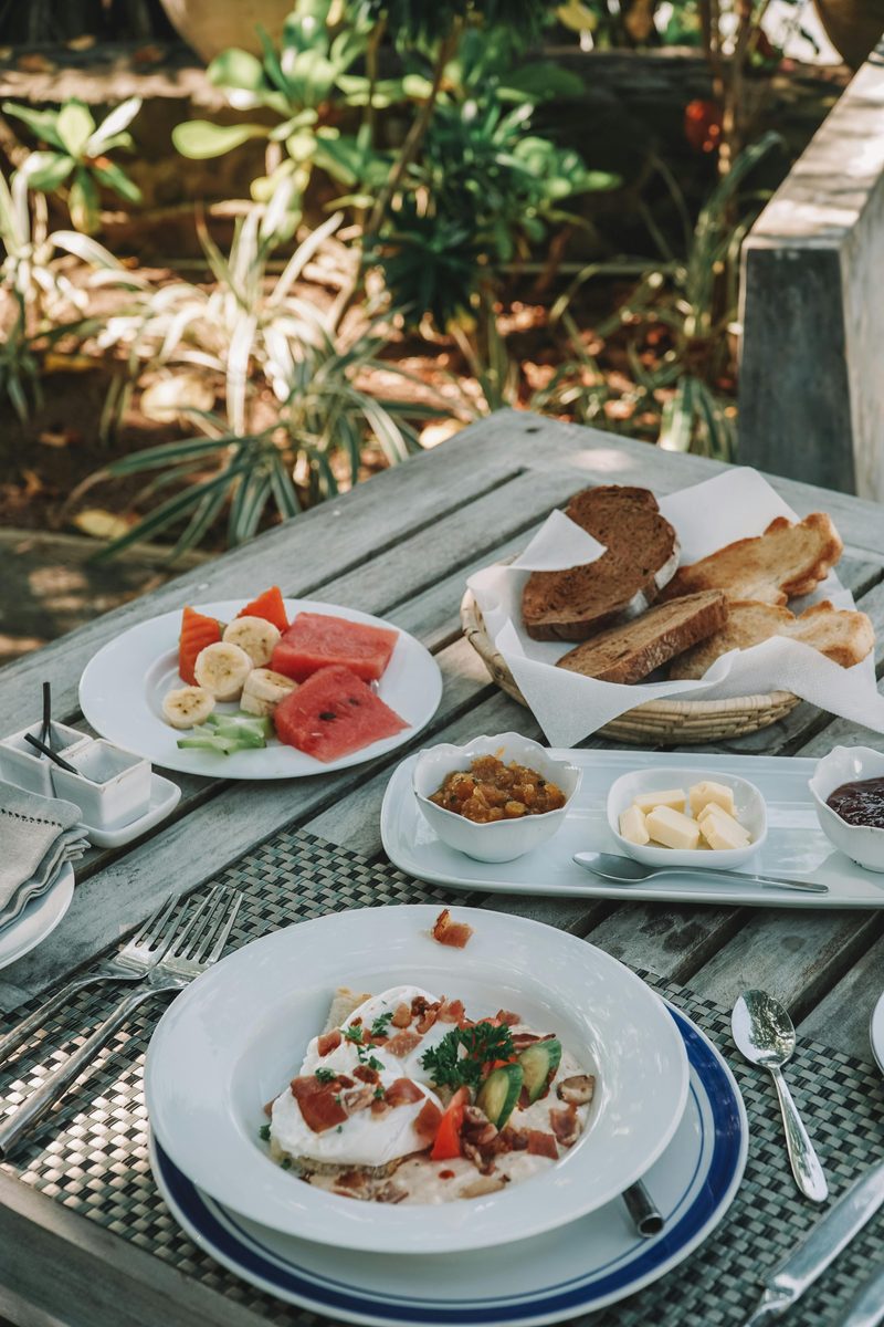 A table set with lunch in a garden