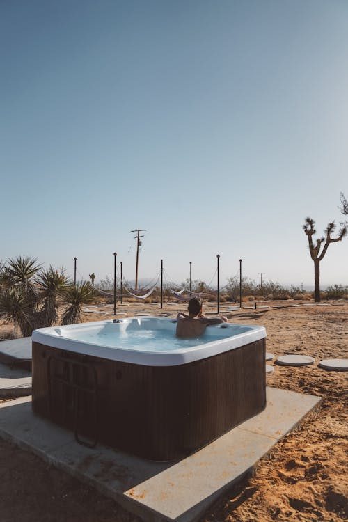 A hot tub on a garden terrace